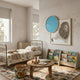 Blossomkin Blue Petal Lion Kids 3D Wall Art by Giant Sculptures displayed in a Nordic children's bedroom above a reading table, beside a round blue mirror.