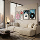 Groovepost Bold Graphics Vinyl Record 5-Panel Wall Art by Giant Sculptures displayed above a cream bouclé sofa in a high-rise living room with cityscape views.