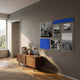 Framegrid Blue Mixed-Size Gallery 7-Set Acrylic Wall Art by Giant Sculptures, with black-and-white landscape panels and blue color blocks above a walnut sideboard.