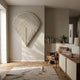 Arclune Ivory Fold Sculptural Felt 3D Wall Art by Giant Sculptures mounted above a leather armchair and bookshelf in a warm minimalist living room.