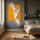 Arcluma Marigold Folded Ribbon Leather 3D Wall Art with white pleated ribbon on yellow panel, displayed above a nightstand in a grey bedroom.
