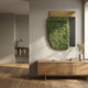 Halvoria Grey & Sage Fibre Panel 3D Wall Art by Giant Sculptures mounted above a wooden sideboard in a neutral hallway with pampas grass and books.