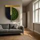 Halvoria Black & Forest Green Fibre Shield 3D Wall Art by Giant Sculptures displayed above a grey sofa in a sunlit living room with wooden flooring.