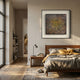 Fiorenze Burnished Geometric Fragment Square 3D Wall Art in black frame above a wooden bed with grey and yellow linens in a sunlit modern bedroom.