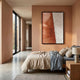 Cartura Copper & White Fold Paper 3D Wall Art by Giant Sculptures displayed above a linen-dressed bed in a terracotta-toned bedroom with a polished concrete floor.