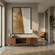 Cartura Bronze & White Fold Paper 3D Wall Art by Giant Sculptures in a black frame above a walnut sideboard in a minimalist hallway with a leather chair.