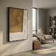 Cartura Bronze & White Angled Fold Paper 3D Wall Art by Giant Sculptures displayed on a neutral bedroom wall beside a linen-dressed bed and bookshelf.
