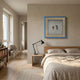 Vitara Torch Lighter & Flame Gun Framed 3D Wall Art by Giant Sculptures hung above a wooden bed with linen bedding in a neutral bedroom with oak floor.