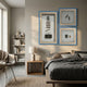 Vitara 3-Set Silver Flask & Cigar Framed 3D Wall Art by Giant Sculptures, blue-framed shadow boxes with cigars, pipe, lighter and flask, in a modern bedroom.
