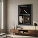 Havanore Cigar, Pipe & Manuscript Framed 3D Wall Art by Giant Sculptures displayed above a walnut sideboard with lamp and books in a sunlit living room.