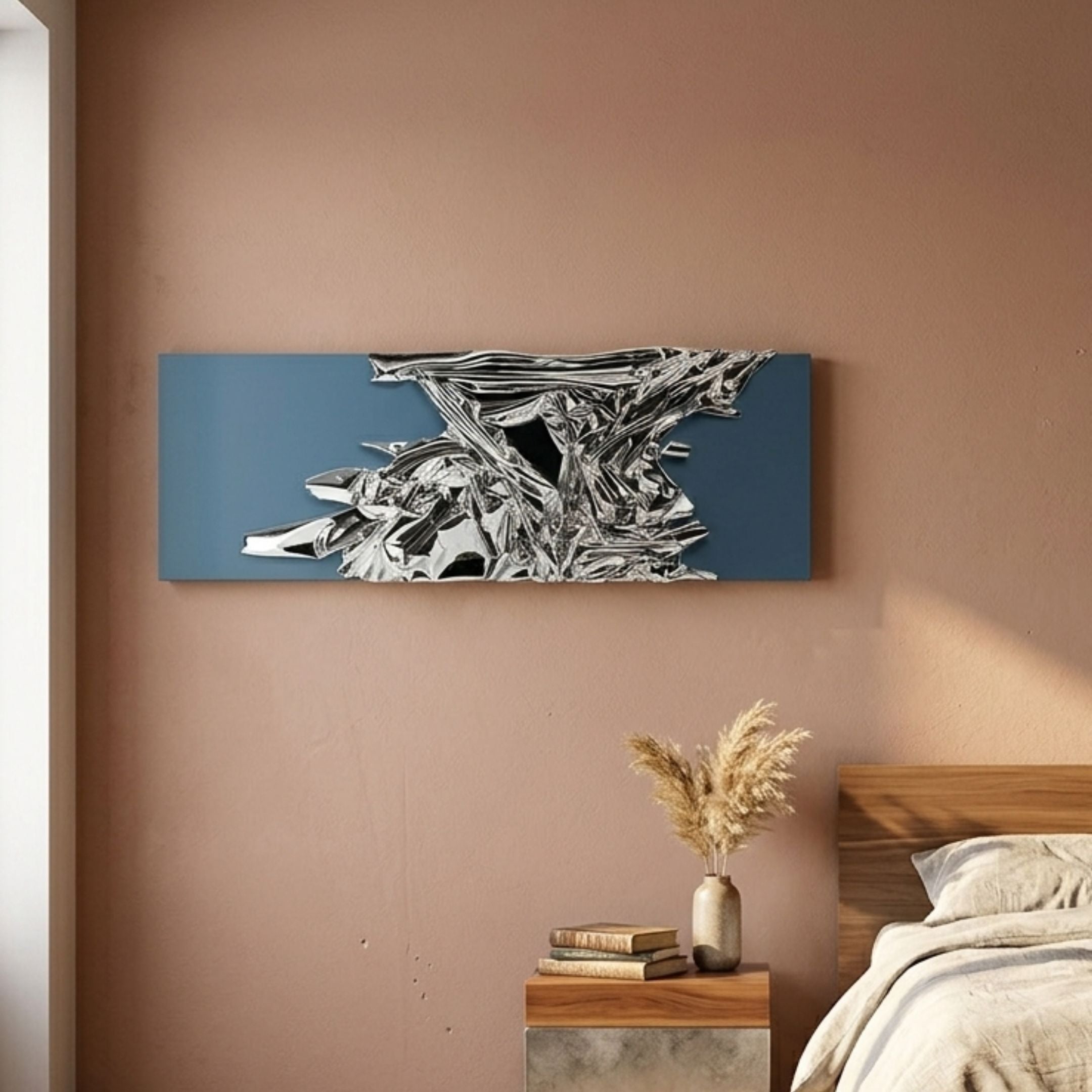 Metarix Silver & Blue Backdrop Leather 3D Wall Art by Giant Sculptures mounted on a terracotta bedroom wall above a wooden nightstand with pampas grass.