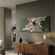 Metarix Silver & Green Backdrop Leather 3D Wall Art by Giant Sculptures mounted above a walnut sideboard with a black vase and lamp in a modern grey-walled room.
