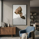 Avalora I Earth Crest Abstract Geometric 3D Wall Art by Giant Sculptures, displayed above a walnut sideboard in a modern living room with a blue armchair.