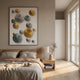 Giant Sculptures Orbienta IV Multi-Tone Disc Cluster 3D Wall Art with raised silver, gold, and teal discs on a white panel above a bed in a Nordic bedroom.