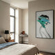 Cavoya Brushstroke Muse Figurative Crystal Porcelain Wall Art displayed in a neutral bedroom beside a window, desk, and bed with linen bedding.