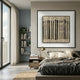 Nerava Vertical Rhythm Black & Cream Abstract Wall Art framed above a bed with brass lamp, styled in a Nordic bedroom with bookshelf and window.
