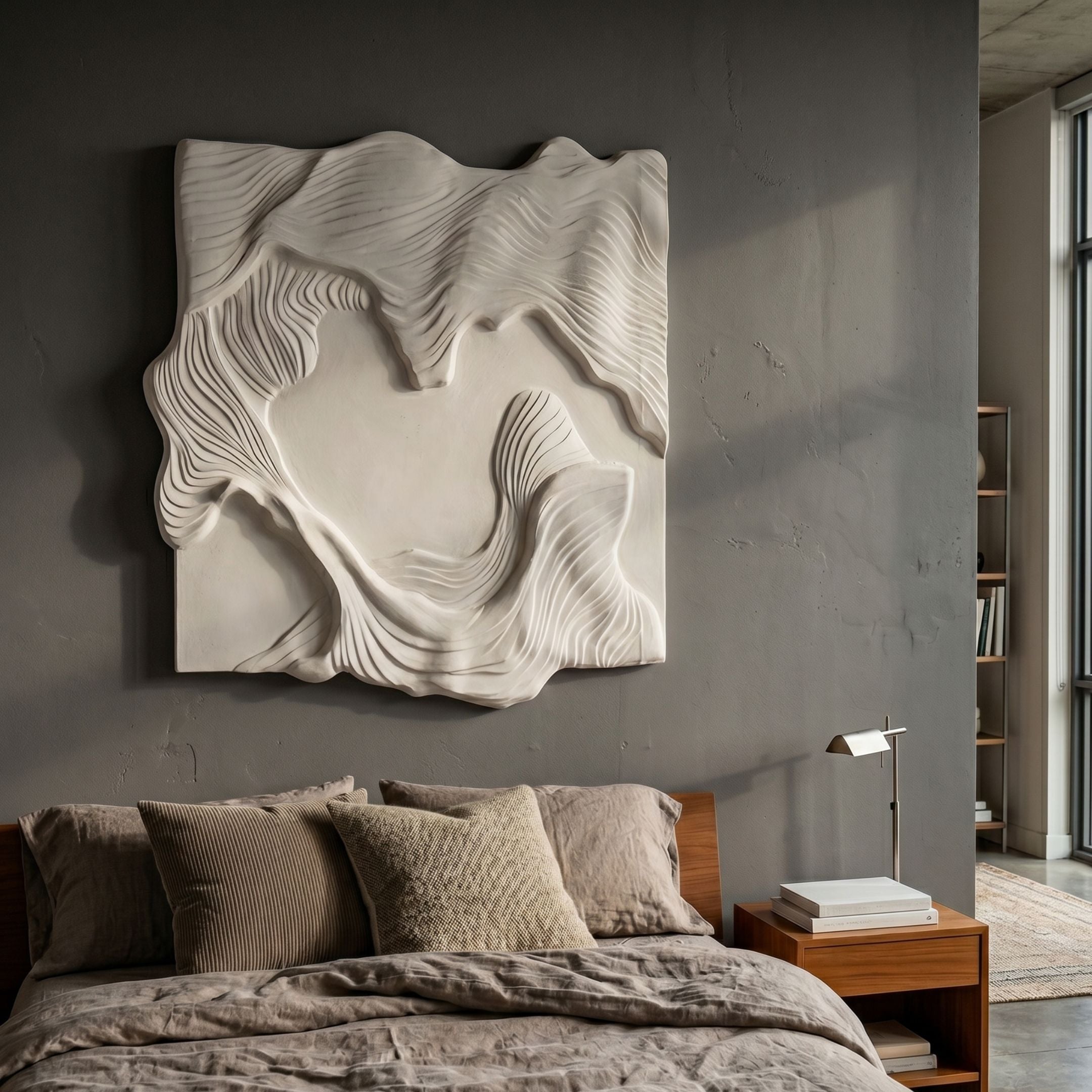 Serava Cream Abstract Wood Relief 3D Wall Art by Giant Sculptures, mounted on a grey bedroom wall above a wooden bed with taupe linens and a nightstand lamp.