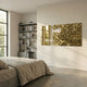 Aurargent Puzzle Gold Textured Steel & Mirror 3D Wall Art by Giant Sculptures displayed as a diptych above a bed in a neutral bedroom with shelving.
