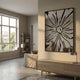Floristra II Petal Bloom Silver Mirror 3D Wall Art by Giant Sculptures displayed on a neutral living room wall above a wooden sideboard near a sunlit window.