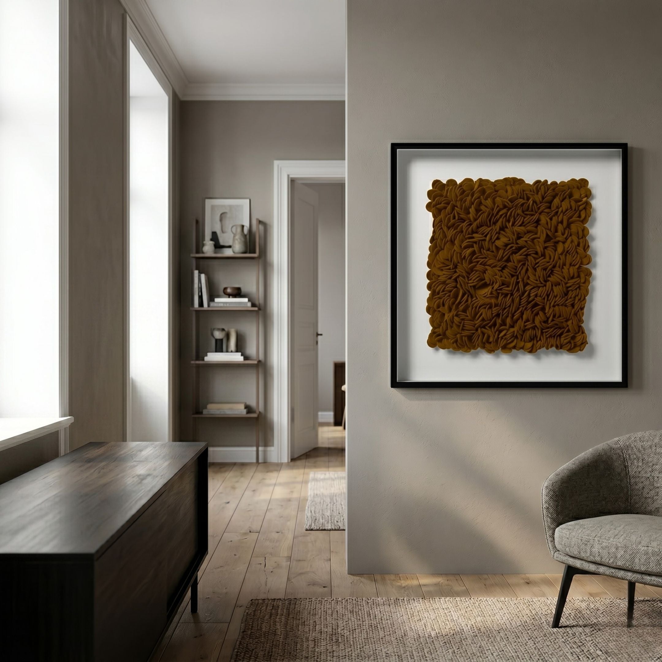 Petalus Brown Ochre Layered Felt 3D Wall Art by Giant Sculptures displayed in a modern hallway with grey walls, a wooden console, and a linen armchair.