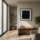 Petalus Black Layered Felt 3D Wall Art by Giant Sculptures displayed above a wooden console in a sunlit minimalist living room with shelving and a plant.
