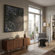 Noctyra Midnight Flow Abstract 3D Wall Art with swirling black lines and blue and white dotted accents, displayed above a walnut sideboard in a sunlit living room.
