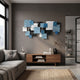 Stravane Blue & Black Mosaic Oil Canvas 3D Wall Art by Giant Sculptures displayed above a walnut media console in a modern grey-walled living room.