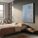 Aqualis Frosted Ice Curve Textured Abstract 3D Wall Art by Giant Sculptures, mounted above a linen-dressed bed in a modern bedroom with sunlit windows.