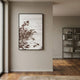 Kairoshi I Pavilion Architectural Silk Relief 3D Wall Art by Giant Sculptures, framed in a hallway with wooden floors and a grey shelving unit nearby.