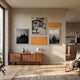 Framegrid Orange Mixed-Size Gallery 5-Set Acrylic Wall Art by Giant Sculptures displayed above a walnut sideboard in a sunlit modern living room.