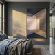 Striatura Bronze & Charcoal Rope Abstract 3D Wall Art mounted on a dark grey bedroom wall above a blue linen bed, with sunlight casting warm shadows.
