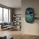 Virellon Blue Gradient 3D Wall Art with silver and green metal balls mounted on a textured wall in a modern living room with sofa and bookshelf.