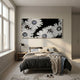 Floravida Pure White Crystal Daisy Floral 3D Wall Art by Giant Sculptures mounted above a bed with grey and beige linens in a sunlit minimalist bedroom.