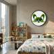Verdifable Round Green Puppy Ears Moss 3D Wall Art mounted above a wooden bed with star-print bedding in a kids' bedroom with toy-filled shelves.