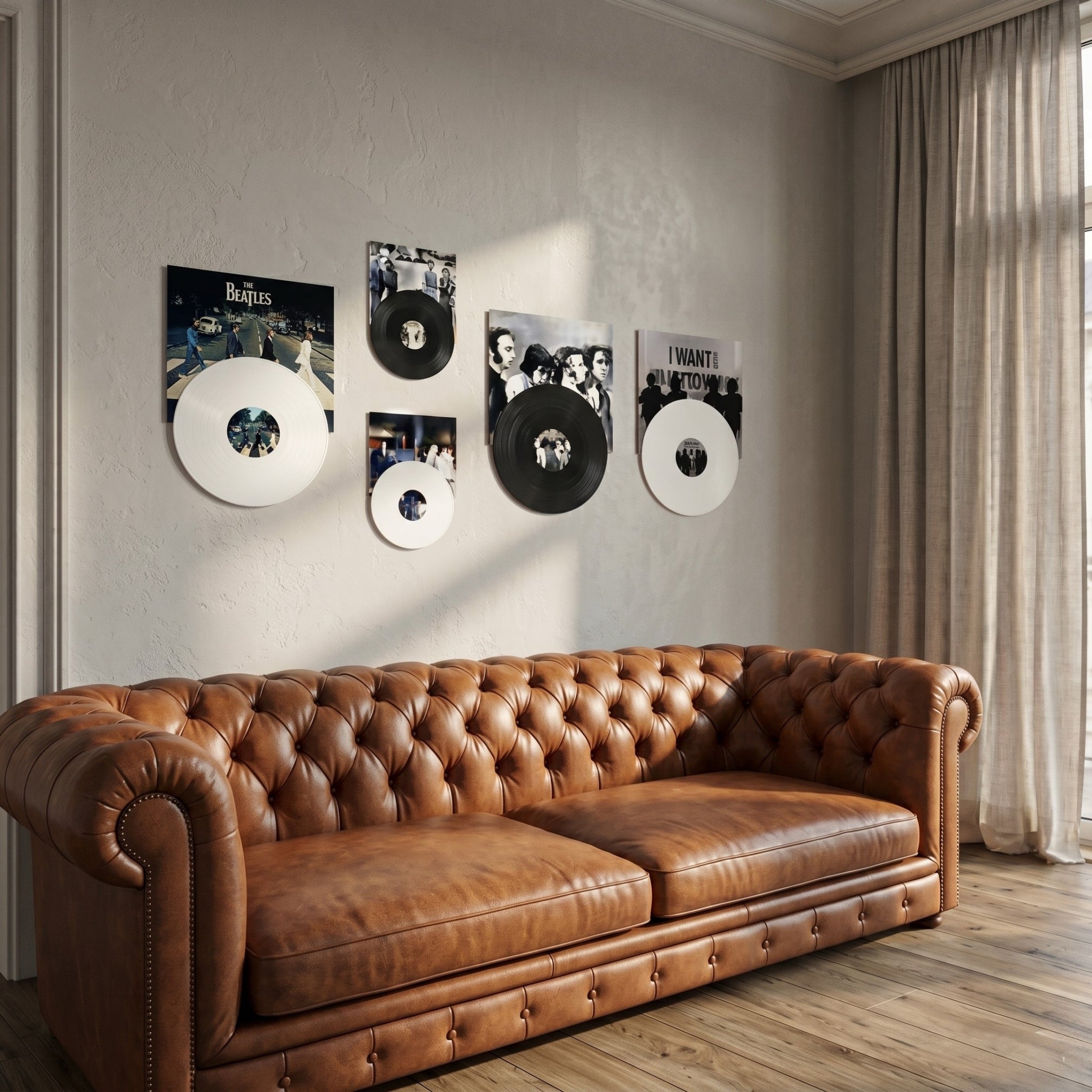 Pressline Beatles Classics Record Collage 5-Panel Wall Art displayed above a brown leather Chesterfield sofa, showing mixed-media canvas panels with vinyl records in black and white tones.