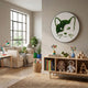 Verdifable Round Green Cat Portrait Moss 3D Wall Art by Giant Sculptures displayed above a wooden toy shelf in a Scandinavian-style children's living room.