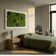 Verdura Modular Green Moss Mosaic 3D Wall Art by Giant Sculptures mounted above a bed with olive green linens, wooden nightstand, and bookshelf nook.