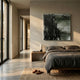 Miravax Forest Fade Ripple Grid Acrylic 3D Wall Art in black, white, and green mounted above a grey linen bed in a sunlit minimalist bedroom.