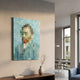 Pixelego Pale Blue Van Gogh Portrait Acrylic Block 3D Wall Art mounted on a beige wall above a wooden console with a vase, near a dining area.