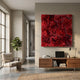 Auralith Crimson Layered Leather & Acrylic 3D Wall Art by Giant Sculptures mounted above a walnut console in a modern living room with armchair and plant.