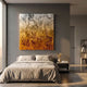 Auralith Amber Fade Layered Leather 3D Wall Art by Giant Sculptures displayed above a linen-dressed bed in a modern grey bedroom with concrete floor.