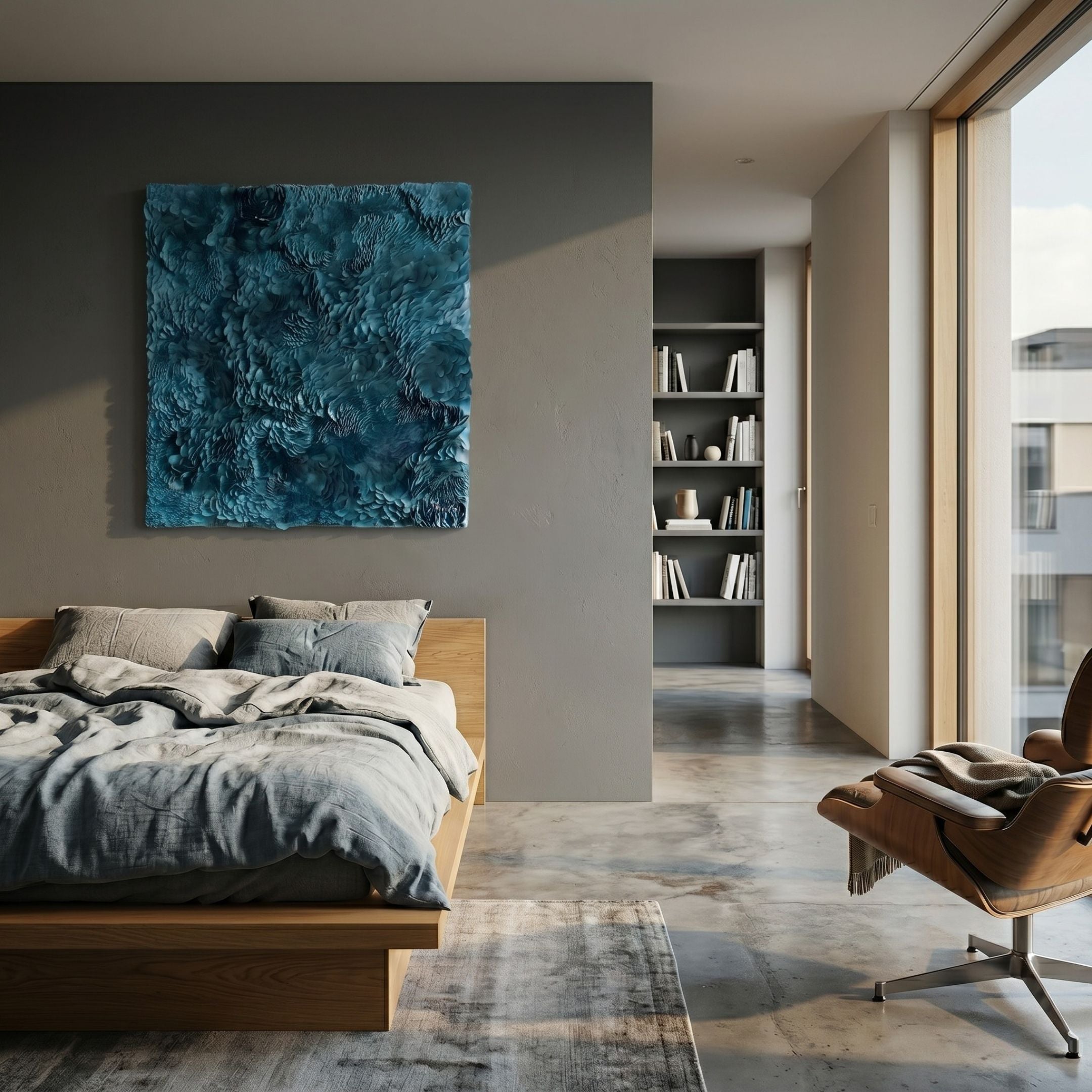 Auralith Teal Blue Layered Leather 3D Wall Art by Giant Sculptures mounted on a grey wall above a wooden bed in a modern bedroom with concrete floors.