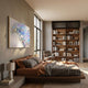 Prismara Azure Wave Iridescent Mesh 3D Acrylic Wall Art in a gold frame above a wooden platform bed, beside a tall walnut bookshelf in a modern bedroom.