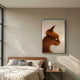 Panthra Ember Orange Acrylic Stripe 3D Wall Art by Giant Sculptures, featuring a ridged feline profile in slim black frame, mounted above a wooden bed.