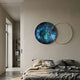 Auricara Sapphire Disc & Metal Ring 3D Wall Art by Giant Sculptures, deep blue and teal acrylic disc with offset gold iron ring, mounted above a bed.