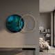 Auricara Emerald Disc & Metal Ring 3D Wall Art by Giant Sculptures mounted on a grey wall in a modern bedroom, pairing a teal acrylic disc with a gold ring.