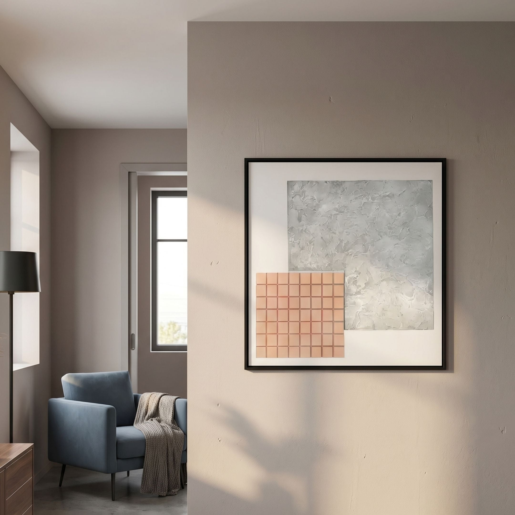 Terracube IV Hand-Painted Framed Acrylic 3D Wall Art by Giant Sculptures displayed on a taupe wall beside a blue armchair, floor lamp, and window.