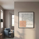 Terracube IV Hand-Painted Framed Acrylic 3D Wall Art by Giant Sculptures displayed on a taupe wall beside a blue armchair, floor lamp, and window.