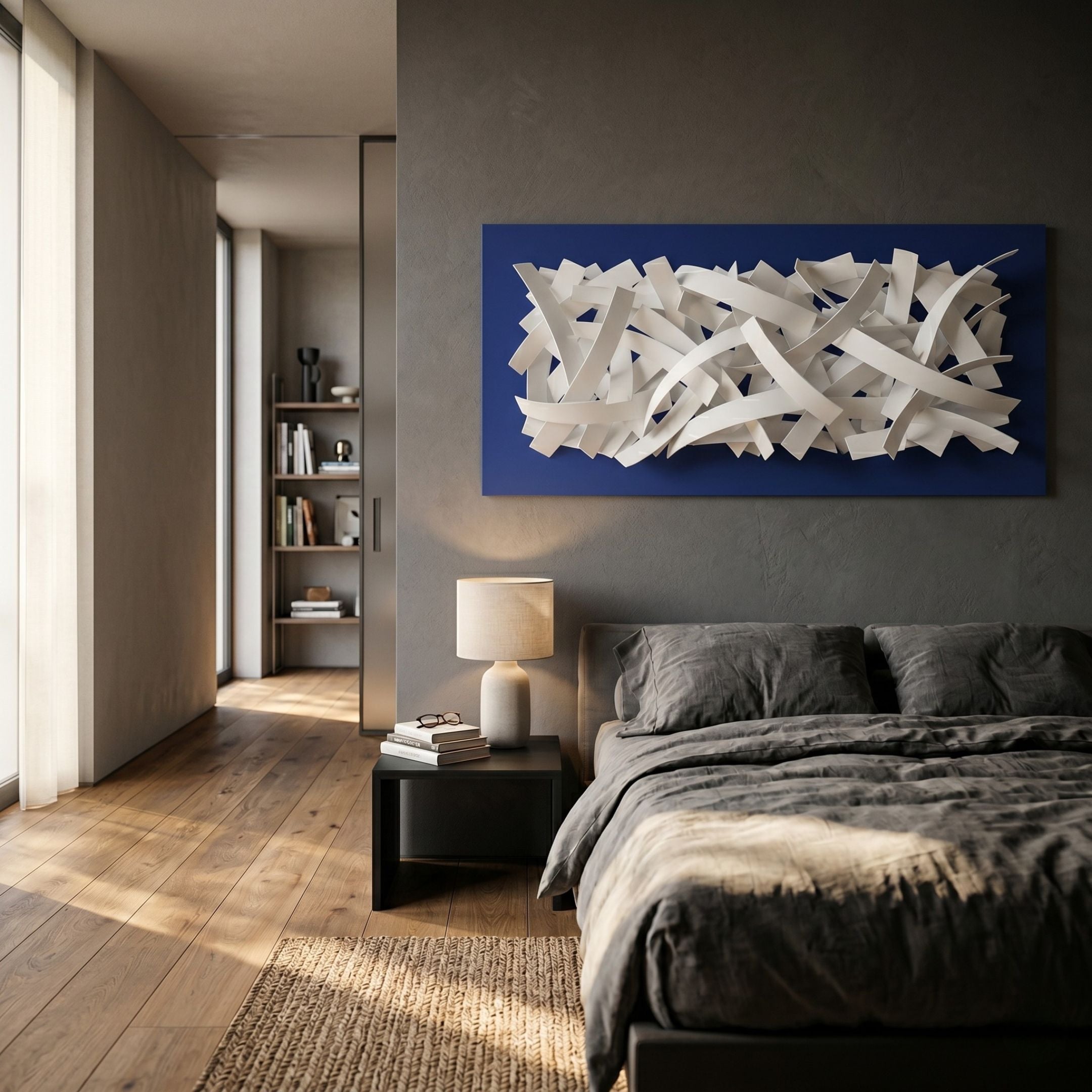 Stravira Blue I Sculptural White Metal 3D Wall Art by Giant Sculptures, white iron lattice on a blue panel, mounted above a bed in a modern bedroom.