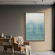 Clarique Aqua Vista Grid Acrylic 3D Wall Art with gold frame displayed above a tan leather armchair and wooden bookshelf in a modern living room.